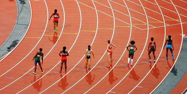 women on a track field